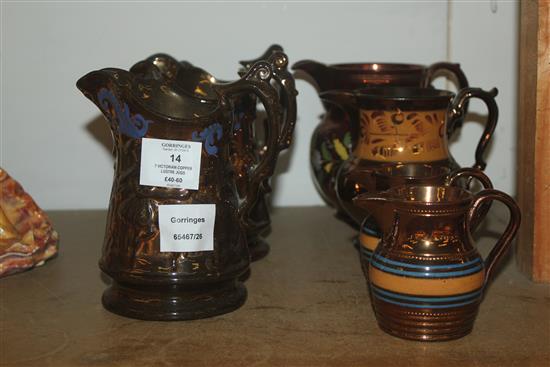 7 Victorian copper lustre jugs
